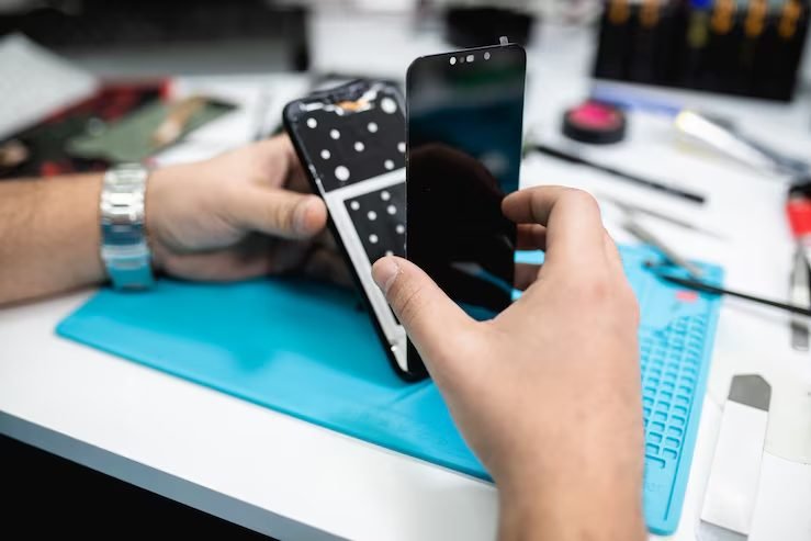 Phone repair bench at FIXIT Mobile Care, Solaris Dutamas